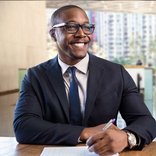 young smiling african american man in business suit
