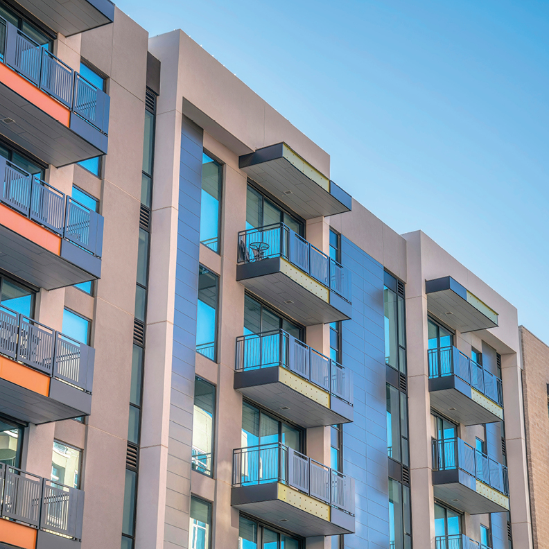 apartment building with patios