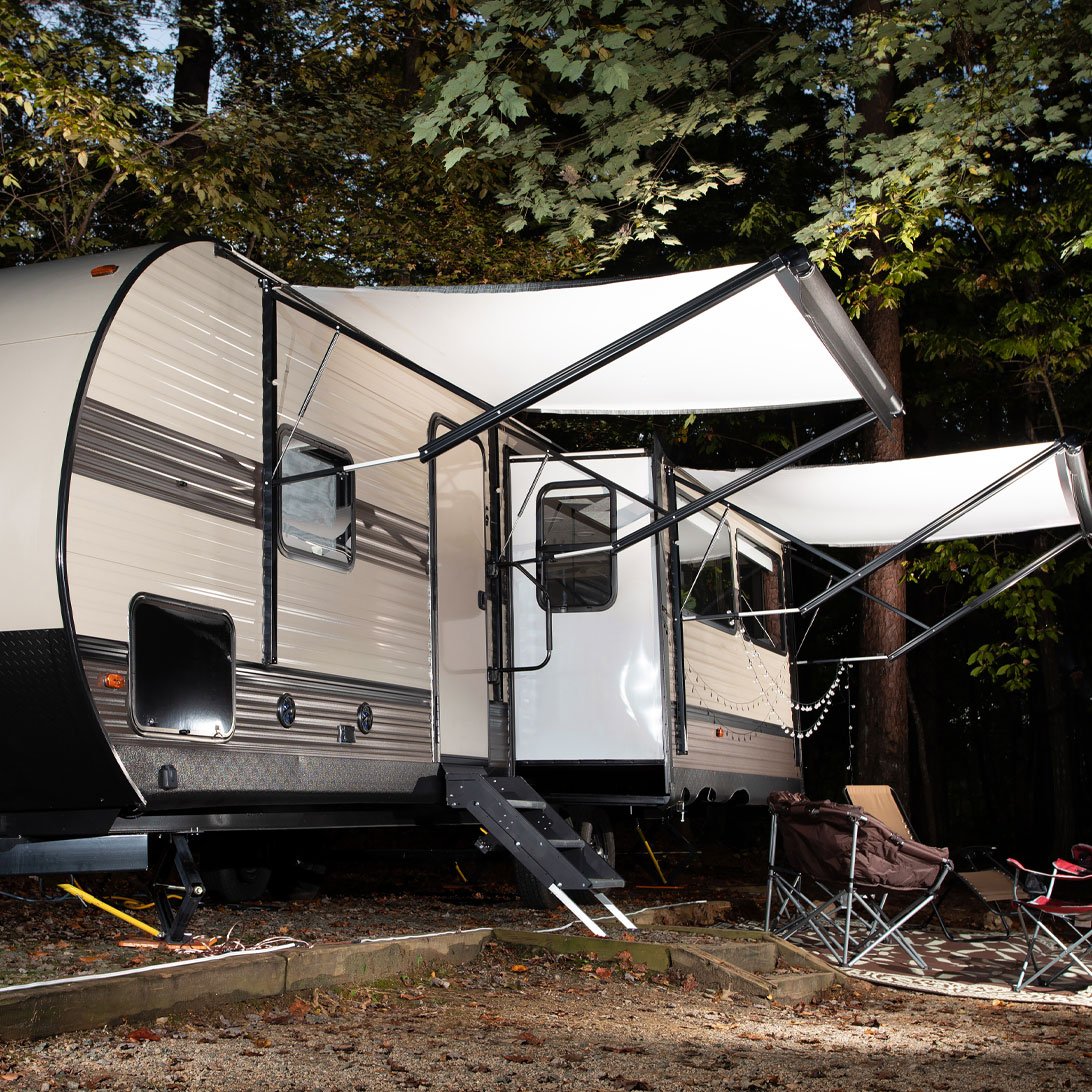 camper trailer in the woods