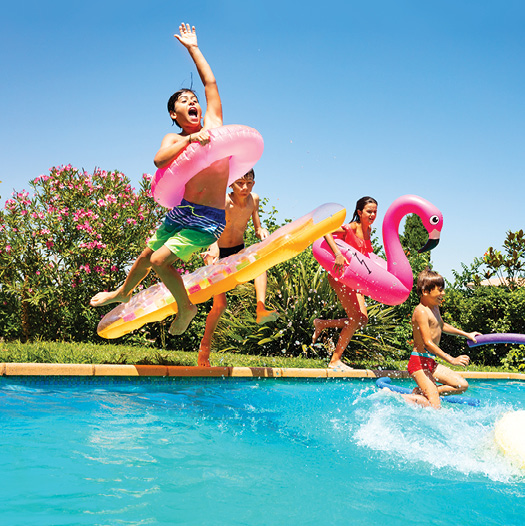 kids jumping into a pool that was funded by a heloc