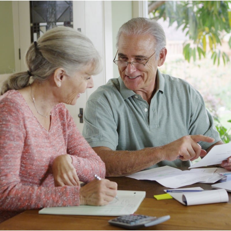Older Couple Paying Bills