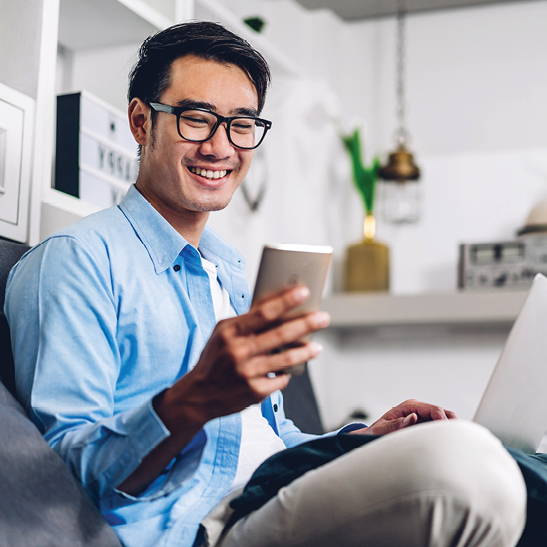 man looking at his online savings account on a mobile phone 