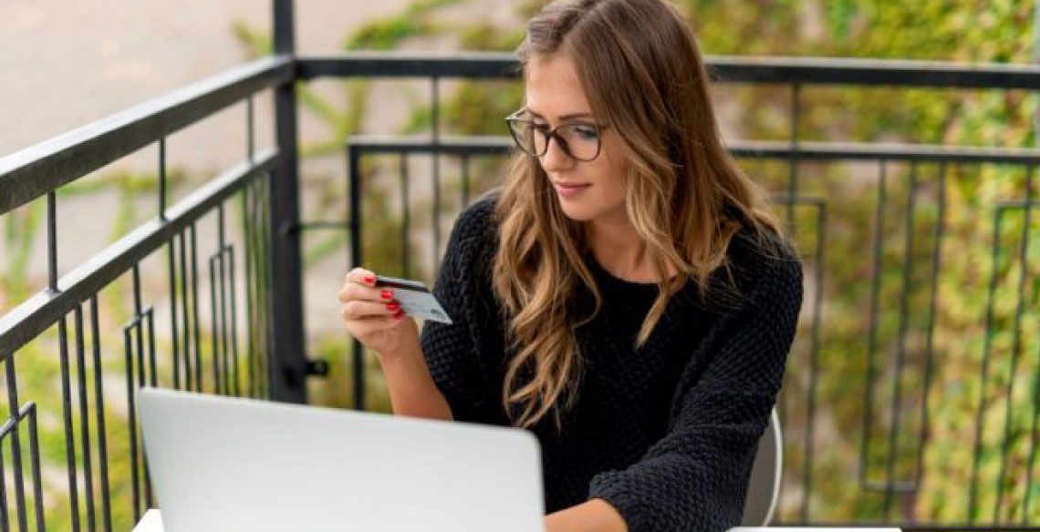 Lady at computer mortgage loan