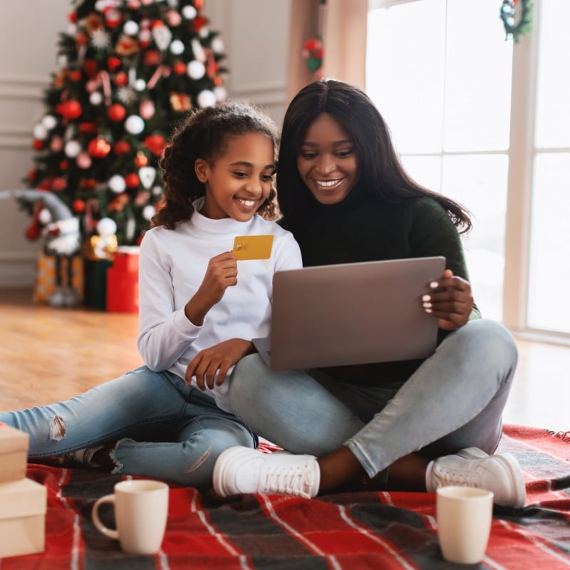 Mother and Daughter On Computer