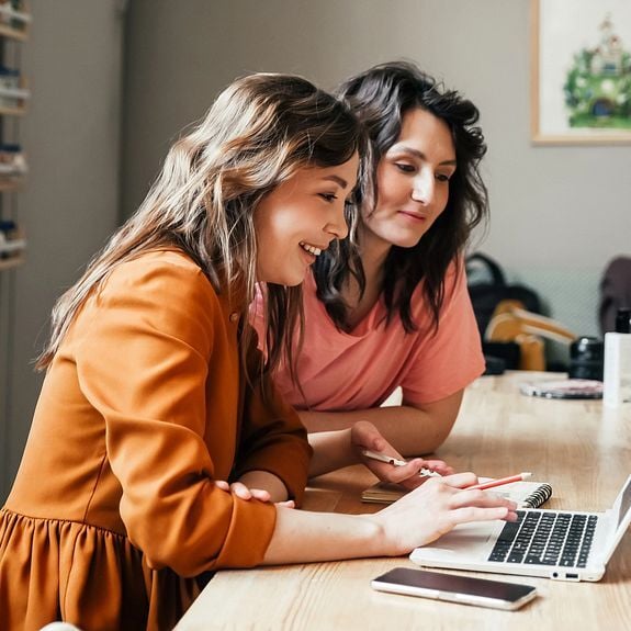 Two Female Business Owners at Desk