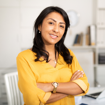 Woman-crossing-arms-smiling