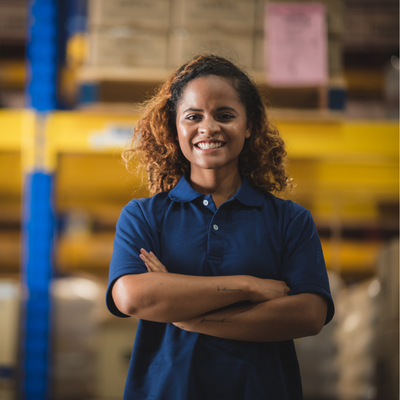 Woman-in-warehouse-smiling
