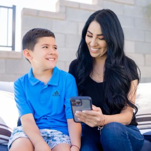 mom-and-son-looking-at-phone