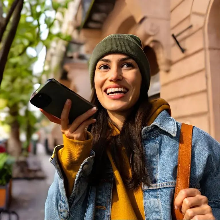 woman talking on speaker phone