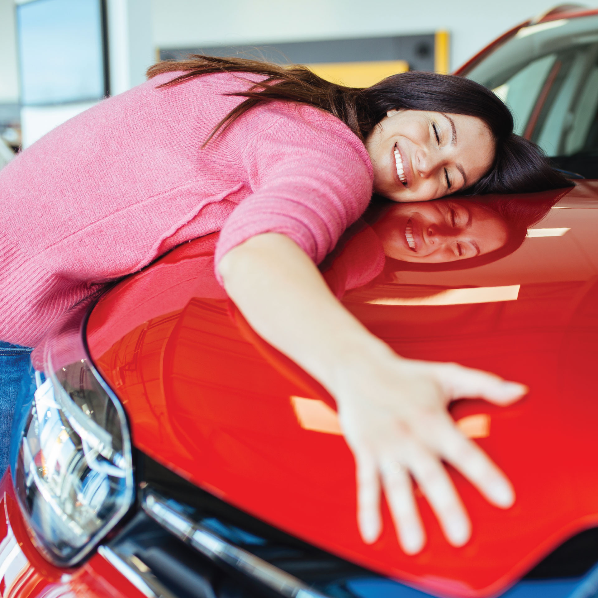 woman-on-red-car